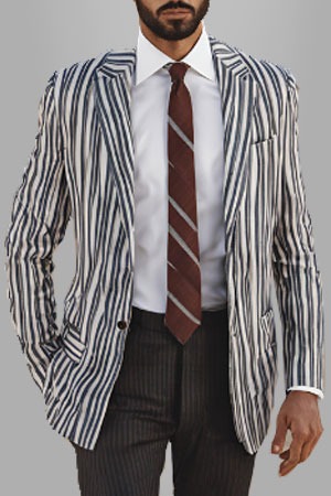 a man in a suit and tie with a tie