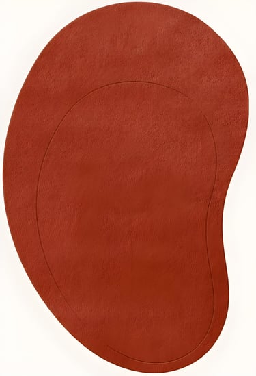 Minimalist terracotta rust irregular organic shape hand-tufted rug with carved outline texture