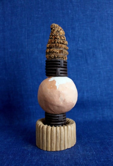 sculpture bois et terre