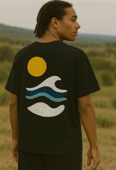 a man with dreadlocks standing in a field