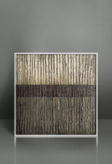 Framed abstract vertical textured wall art in metallic gold and black with a white frame.