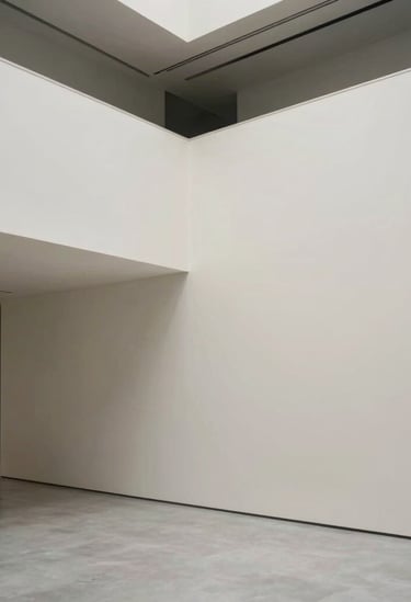 Clean, architectural photography of a modern event space in Spain, minimalist lines, neutral off-white and medium grey tones, professional and sophisticated atmosphere.