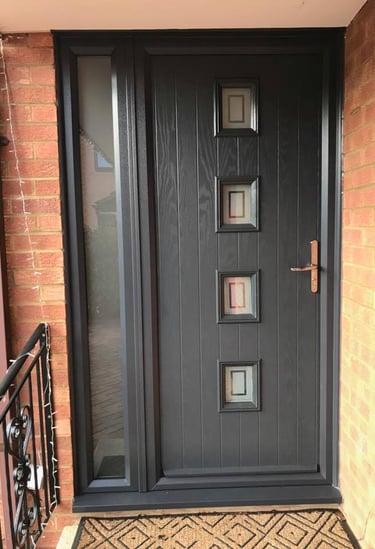 anthracite grey composite front door with side panel and decorative glass