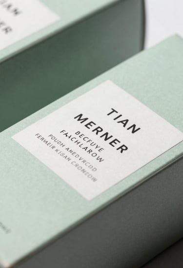 Detail photography of a premium product packaging for a luxury skincare brand, using light green and grey colors, minimalist labels, shot in a bright South American / Brazilian professional studio.