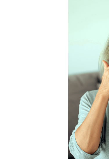 Adult with myopia rubbing her eyes