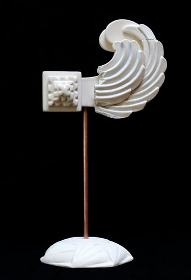 Very small ceramic sculpture of fragmented, reconstructed Greek Archaic-style wing.