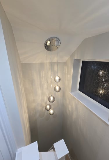 Hanging light in the stair well installed by Easy Spark Ltd in Bromley Kent