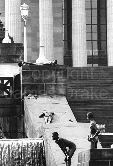 Swimmers in the fountains of the Philadelphia Museum of Art in the 1960s by James Drake