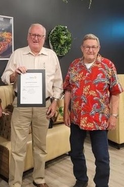 President Keith receives his 25 year Service Award from Treasurer Rod See