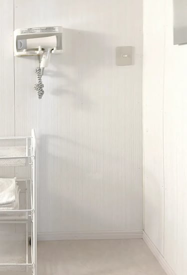 Modern and private shared shower room facilities at Ryokan Nakadaya Asakusa.