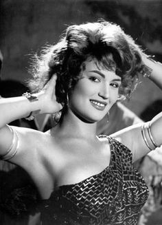 Bellydancer Nagwa Fouad wearing assuit dress