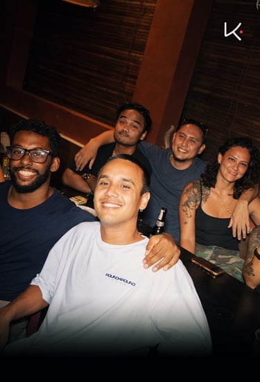 Kenji Ramen Bali vibrant evening atmosphere - izakaya dining with music and entertainment