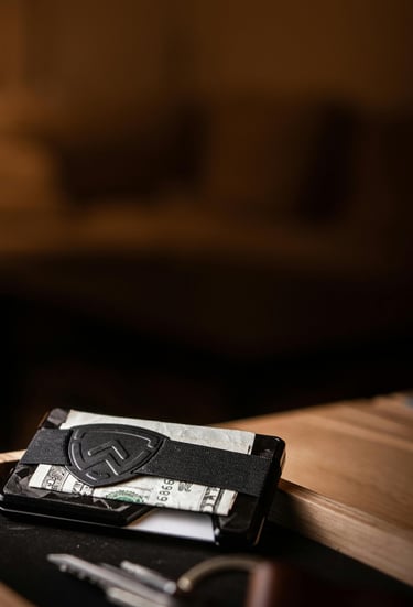A wallet and keys in a tray