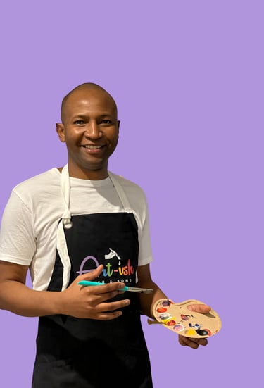 Castein in a apron holding a paintbrush