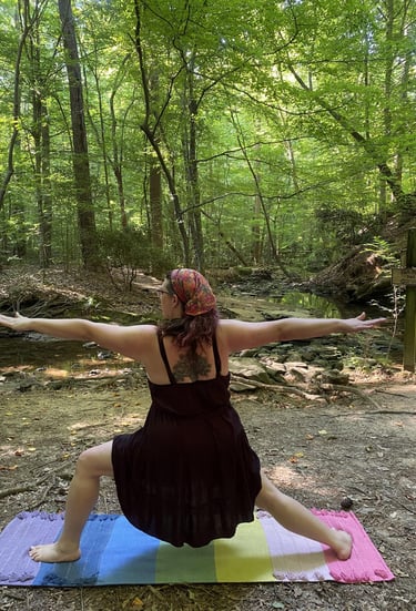 Rachel outdoor and forest with rainbow mat black dress yoga pose