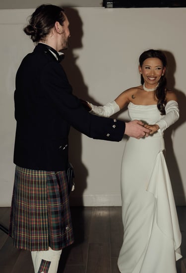 a man in a kiltrum kilt and a woman in a kilt