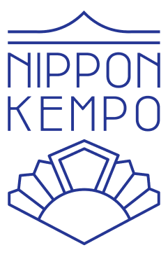 a blue and white logo with the words nippon kempo
