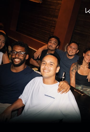 Kenji Ramen Bali vibrant evening atmosphere - izakaya dining with music and entertainment