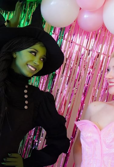 Elphaba and Glinda do their special wave