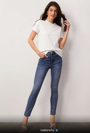 a woman in jeans and a white t - shirt