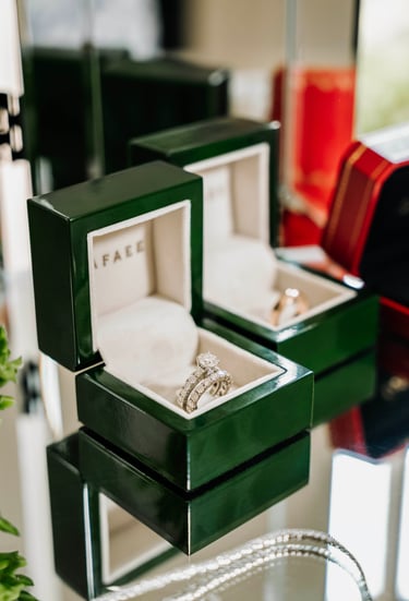 Close-up of wedding rings in boxes