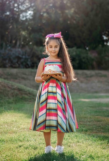 Girl in colorful striped dress posing outdoors – Fred Art Studio session