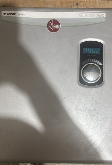 a silver and silver colored electric water heater