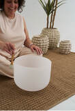 Kelly playing a crystal singing bowl
