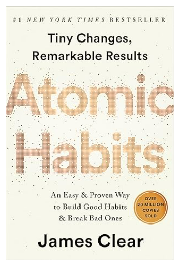 Atomic Habits book cover with clean design and dotted title text.