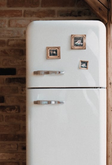 a fridge with tiny painted magnets