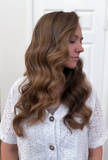 Modern romantic bride in Lodi winery suite with soft waves and pinned-back style