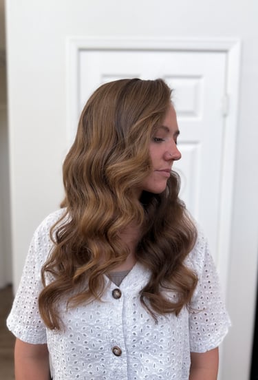 Modern romantic bride in Lodi winery suite with soft waves and pinned-back style