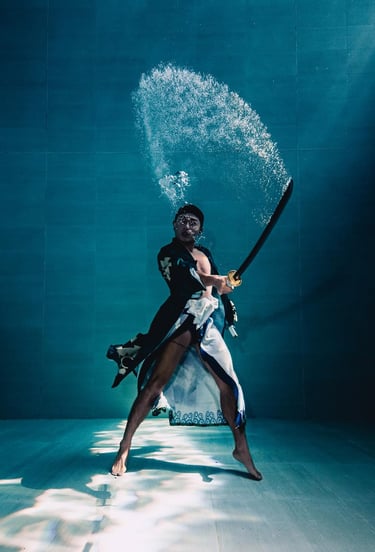 Afa Zhang doing an incredible sword trick underwater - photo by @kennywang627
