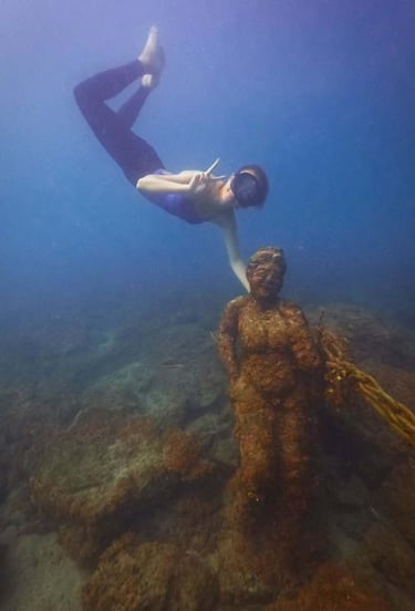 Helena visiting one of the famous underwater statues in Jeju