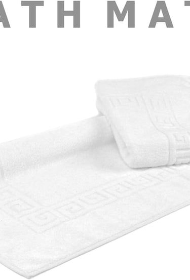 a bath mat with a towel and a towel
