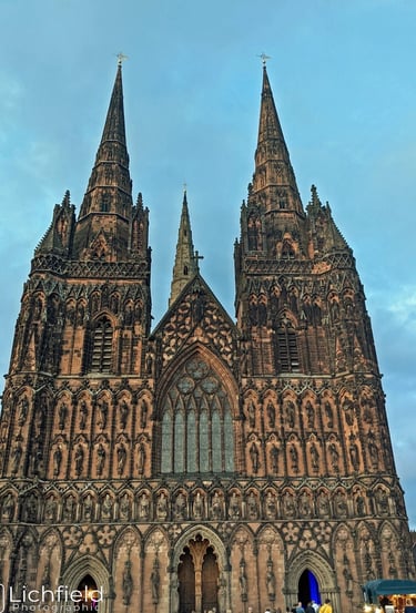 Lichfield Cathedral against a blue sky