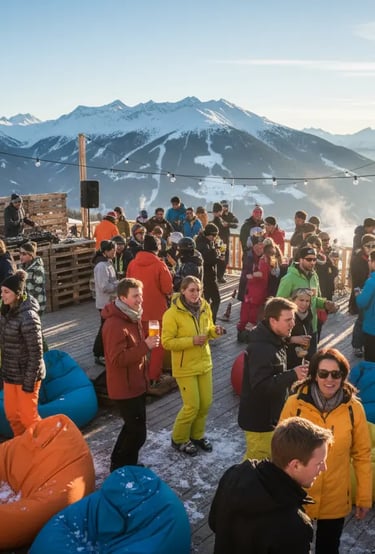 A crowded outdoor après-ski terrace with people enjoying drinks and music against a backdrop of snow