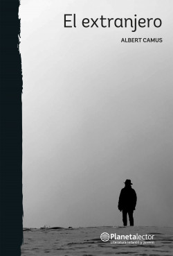 a man standing in the snow with a hat on