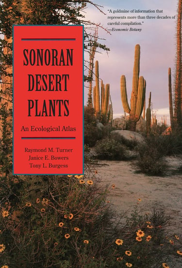 Book cover of Sonoran Desert Plants An Ecological Atlas featuring Saguaro cacti and desert wildflowers.