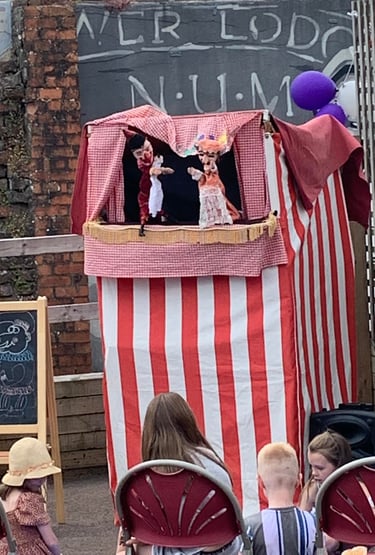 Carl the Magician Traditional Punch and Judy puppet show at a festival 
