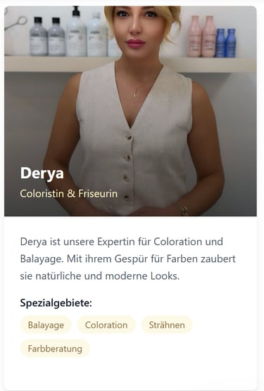 a woman with blonde hair and a white top