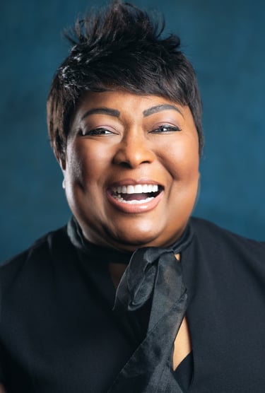 a woman with a black tie and a black tie