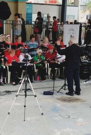 The District Singers perform at Cronulla Mall