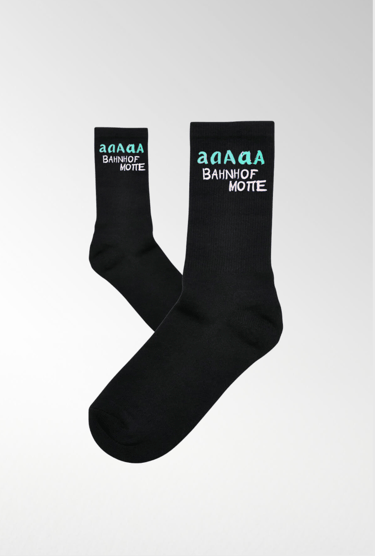 a pair of socks with the words,'a good day for a movie, merch, Bahnhof motte