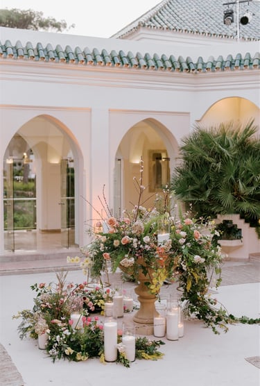 Outdoor dining area at Villa El Rincon in Marbella, with beautiful decorations for a Mediterranean destination wedding.