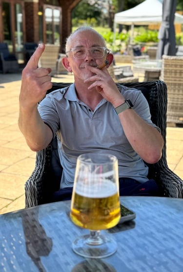 Sat on the patio at the golf club with beer and cigar