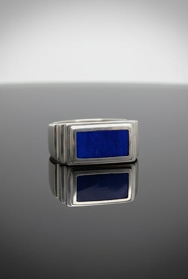Custm cut lapis lazuli signet ring set in sterling silver. All work done by Kelly Allanson