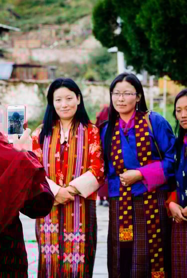 Bhutanese-Women-Getting-Ready-For-A-Quick-Pose-At-Jambay-Lhakhang-Drub-Festival