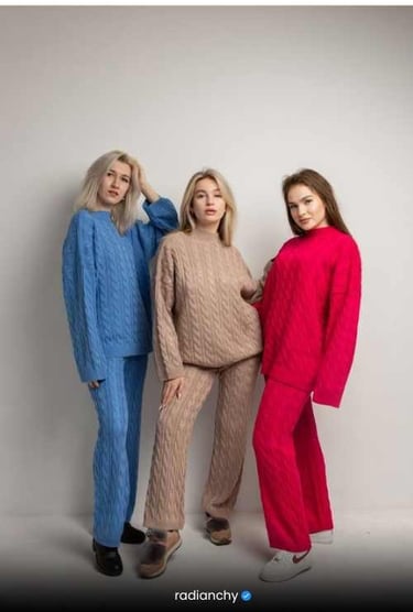 three women in matching knitted sweaters and matching sweaters