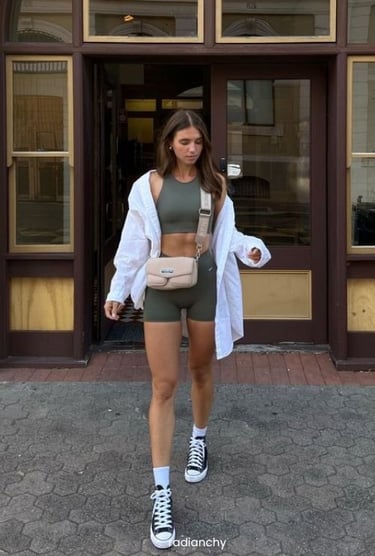 a woman in a sports bra top and shorts